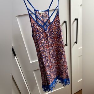 Multi color adjustable strap dress with bottom fringe detail